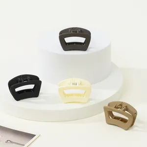 Set mit 4 matten Trapez-Haarklammern in Schwarz, Kaffee, Beige und Khaki