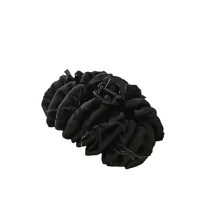 Large black bubble fabric hair claw clip with fringe edges and letter texture pattern