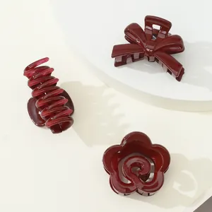 Three-piece set of deep wine red hair claws in butterfly flower and spiral shapes