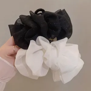 Oversized lace seersucker hair claws in black and white set for elegant hairstyling