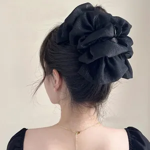 Oversized black lace seersucker scrunchie hair clip for elegant bun hairstyles