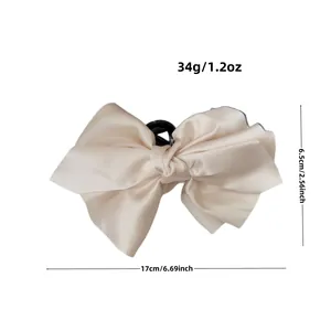 Elegant champagne satin bow hair claw clip for women, size 17cm by 6.5cm and weight 34g