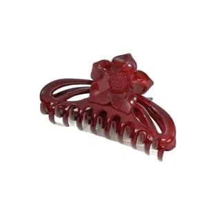 Pince à cheveux fleur rouge foncé brillante avec texture céramique élégante pour femmes