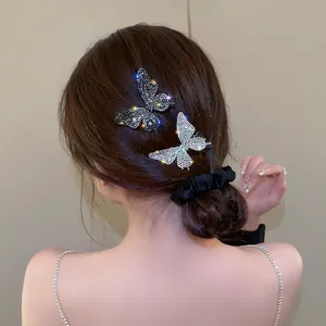 Set di fermagli per capelli a farfalla con strass scintillanti e elastico in velluto
