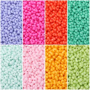 Close-up of 4x6mm glass peanut beads in macaron colors for DIY jewelry making