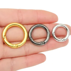 Three alloy spring o-rings in gold, gunmetal and silver finishes for DIY bag accessories
