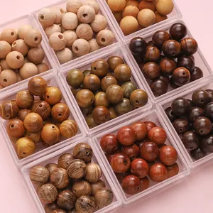 Detailed macro view of 10mm assorted wooden beads with natural grains in grid storage box