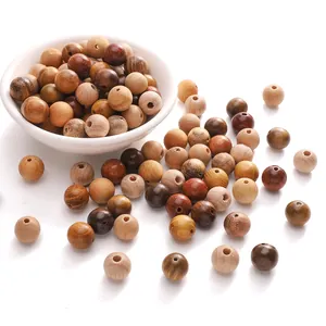 Polished 10mm natural wood round beads for DIY jewelry making in assorted brown tones