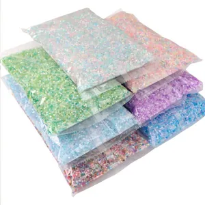 Assorted pastel square glass beads in transparent bags for DIY jewelry and nail art
