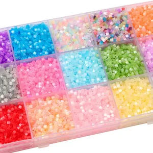 DIY fuse beads kit with colorful plastic beads in a transparent compartment organizer box
