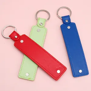 Three colorful rectangular leather keychains with spring rings and silver metal hardware