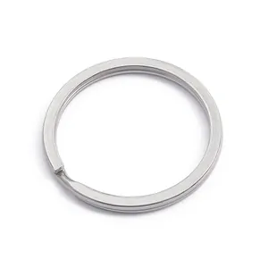 Close-up of flat stainless steel split key ring with brushed metal texture for DIY