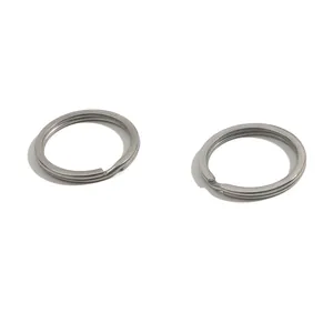 Flat lay of two thick stainless steel flat key rings on white background for DIY crafts