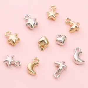 Mix van gouden en zilveren metalen bedeltjes in ster, hart en maan vorm voor DIY sieraden