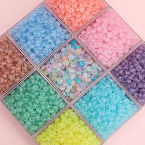 3x6mm colorful glass abacus beads organized in a grid box for DIY jewelry making