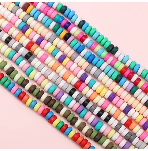 Close-up of colorful 6x3mm polymer clay disc beads for DIY jewelry making and bracelets