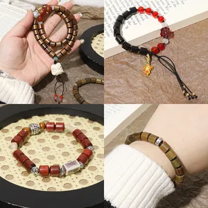 Handmade Chinese style wooden bead bracelets with sandalwood and carved charms