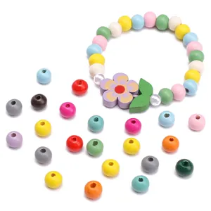 Colorful wooden bead children bracelet with flower charm and matching loose DIY beads