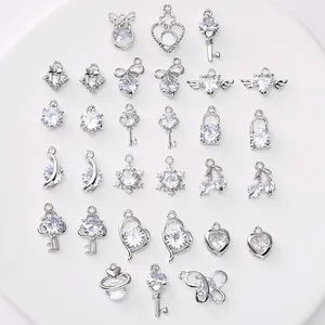 Silver-plated zircon charms set with butterfly, heart, and key shapes for DIY jewelry