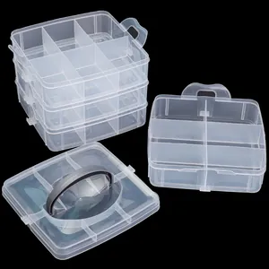 Macro view of clear multi-layer plastic storage box with adjustable dividers and handle