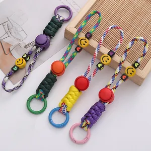 Colorful woven parachute cord keychains with smiley face beads and alloy clips
