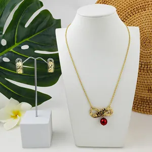 Golden MOM infinity necklace with red bead and floral engraved hoop earrings set