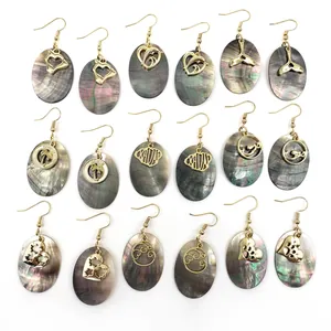 Set of 9 tropical natural black shell oval earrings with golden Hawaiian charms