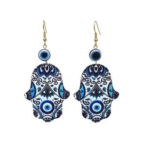 Blue Hamsa Hand and Evil Eye acrylic drop earrings with bohemian patterns and gold hooks