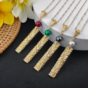 Hawaiian plumeria pendant necklaces with colorful shell pearls on a gold floral plaque