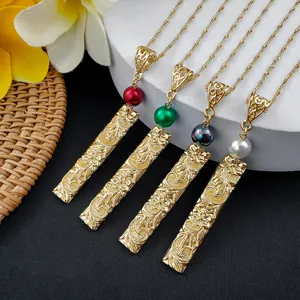 Macro detail of retro gold rectangle relief pendants with colorful pearl accents