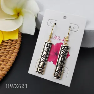 Vintage Samoan pattern drop earrings with gold floral scrollwork and shell pearls