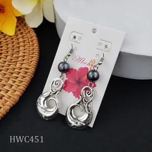 Samoan totem drop earrings with dark shell pearls and fish hook dolphin metal pendants
