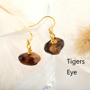 Close-up of natural tigers eye gemstone earrings with gold-plated stainless steel hooks