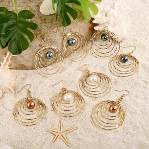 Minimalist multi-layered hollow gold circular earrings with natural shell pearl drop charms