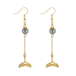 Elegant gold whale tail drop earrings with grey pearl beads and heart cutout design