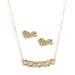Vintage gouden sieradenset met zirkoon oorbellen en bijpassende hanger en ketting