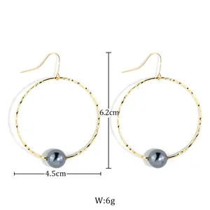 Detail showing dimensions of gold-plated hoop earrings with grey mother-of-pearl pearls