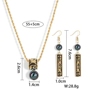 Detailed view of Hawaiian jewelry set with size dimensions and Polynesian black enamel motifs