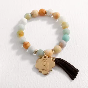 Natural amazonite beaded bracelet with gold flower letter D pendant and brown tassel decor