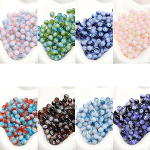 Detailed view of 8mm-10mm colorful patterned glass beads for DIY jewelry making