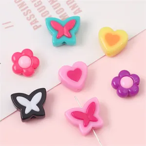 Colorful acrylic beads in butterfly heart and flower shapes for DIY jewelry making