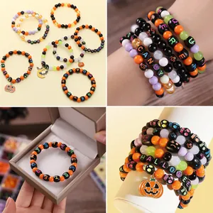 Kit de pulseras Halloween DIY con dijes de calabaza y cuentas acrílicas en caja de regalo