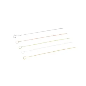 Set of assorted metal eye pins in gold and silver for DIY jewelry making and crafts