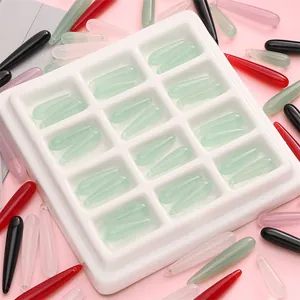 Colorful resin jade drop pendants in storage tray for DIY jewelry making and crafts
