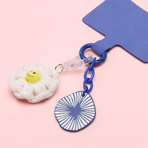 Durable blue velvet phone lanyard patch with white woven flower and smiley bead set
