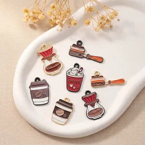 Detail of coffee-themed alloy charms including cups and kettles for DIY jewelry making