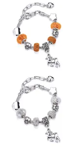 Close-up of rainbow crystal unicorn charm bracelets with colorful beads and silver pendants