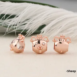 Detailed views of rose gold sheep beads with crown and crystals for charm bracelets