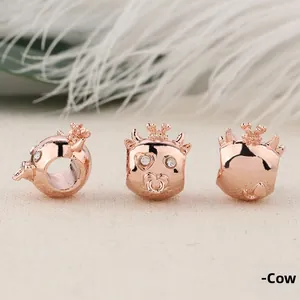Detailed views of rose gold cartoon ox charm with sparkling crystals for DIY bracelets