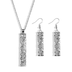 Elegant silver bamboo engraved jewelry set including necklace and matching earrings